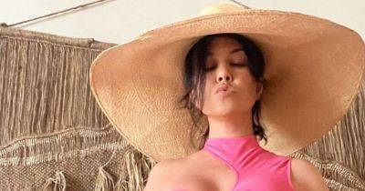 Pregnant Kourtney Kardashian glows in stunning new bikini snaps from Hawaiian getaway - www.ok.co.uk - Hawaii