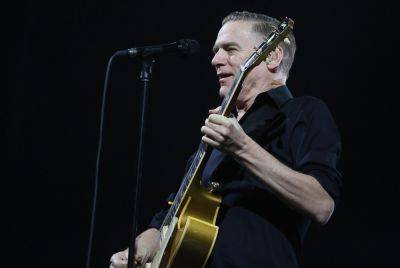 Bryan Adams Doesn’t Miss A Beat After Fan Rushes The Stage To Sing ‘Summer Of ’69’ - etcanada.com - county Bryan - city Salt Lake City - county Adams
