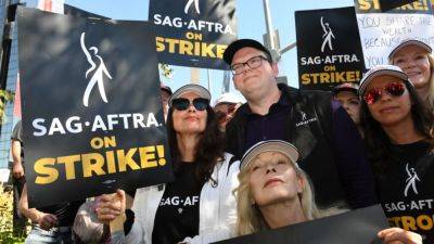 How the 2023 SAG-AFTRA Strike Is Affecting Hollywood: From Canceled Premieres to Empty Sets - www.etonline.com - Hollywood - county Lawrence