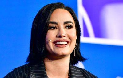 Demi Lovato shares new song with Slash and announces rock album ‘Revamped’ - www.nme.com - Spain