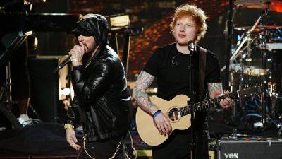Eminem Surprises Crowd at Ed Sheeran Concert in Detroit With 'Lose Yourself' Performance - www.etonline.com - Los Angeles - Nashville - Detroit - Michigan - city Lions