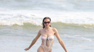 Julia Fox Took the All-White Trend to the Beach in a Skimpy One-Piece and Heels (Yes, Heels) - www.glamour.com - New York