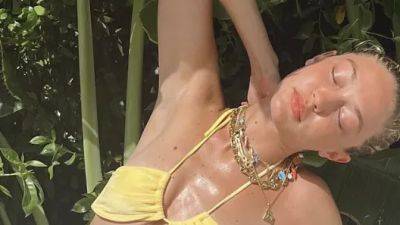 Gigi Hadid Appears Completely Unbothered in Vacation Pics Posted After News of Her Arrest Breaks - www.glamour.com