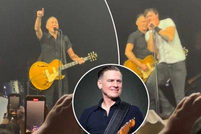 Bryan Adams fan booted off stage after commandeering mic mid-concert - nypost.com - county Bryan - city Salt Lake City