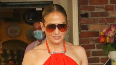 Jennifer Lopez Is Impossible to Miss in This Billowing Crimson Tent Dress - www.glamour.com - Paris - New York - Los Angeles - Hollywood - county Collier