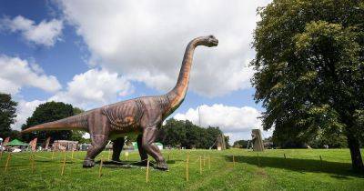 Dozens of animatronic dinosaurs descend on Heaton Park for school holidays - www.manchestereveningnews.co.uk - Manchester