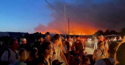 Parts of Corfu evacuated as disastrous wildfires start on second Greek island - www.manchestereveningnews.co.uk - Britain - Santa - Greece