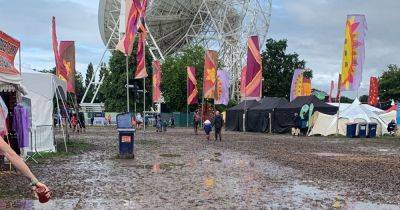 Crowds brave 'mud bath' Bluedot festival as 'unprecedented amount of rain' sees day tickets cancelled - www.manchestereveningnews.co.uk