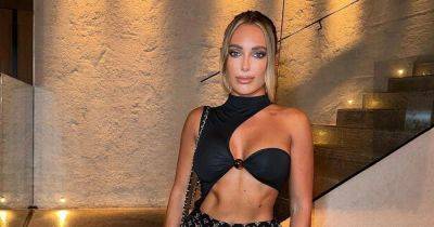 TOWIE's Amber Turner shows off toned abs in unusual cut-out top on 8th holiday of year - www.ok.co.uk - Spain - Cyprus - county Turner