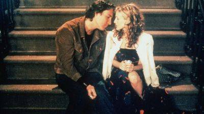 From 'Sex and the City' to 'And Just Like That': Look Back at Carrie Bradshaw and Aidan Shaw's Romance - www.etonline.com