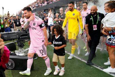 Lionel Messi Comforts DJ Khaled’s Son Asahd After Walking Out On The Field Together At Inter Miami Match - etcanada.com