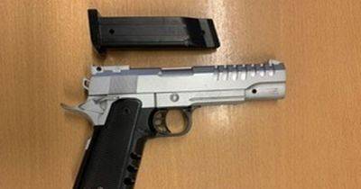 BREAKING: Boy, 13, arrested after fake gun fired at people on busy street - www.manchestereveningnews.co.uk - Manchester