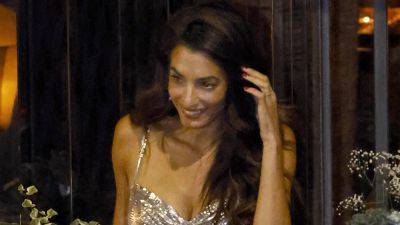 Amal Clooney Wears Standout Summer Style While on Dinner Date With Husband George in Lake Como - www.etonline.com - Italy - George - Lake