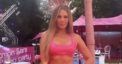 Danielle Lloyd channels Barbie at pink party in gorgeous two-piece - www.ok.co.uk