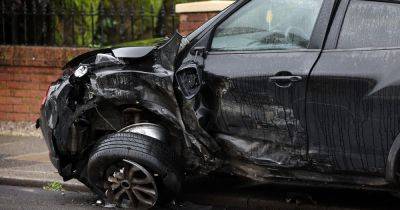 Carnage on street as cars wrecked and wall knocked through in 11-VEHICLE smash - www.manchestereveningnews.co.uk - Manchester