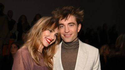 Robert Pattinson and Suki Waterhouse Hold Hands in Barbie-Inspired Outfits - www.glamour.com - New York - county Hand