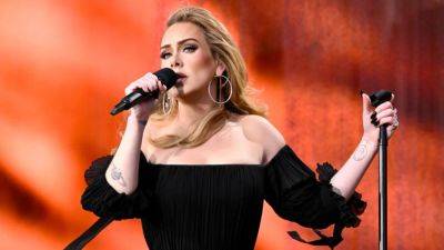 Adele Jokingly Dares Concertgoers to Throw Things at Her: 'I'll F**king Kill You' - www.etonline.com - Las Vegas - New Jersey
