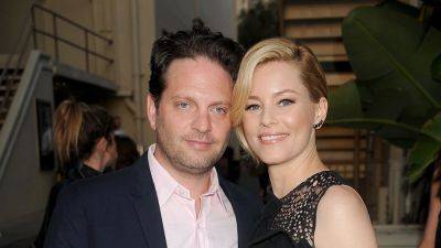 Elizabeth Banks Flashes Stunning Sapphire Ring While Celebrating 20th Wedding Anniversary in Italy - www.etonline.com - Italy - Pennsylvania - county Banks