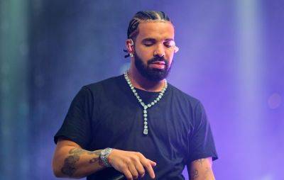 Watch Drake kick off delayed ‘It’s All A Blur’ tour with giant sperm hologram - www.nme.com - Illinois