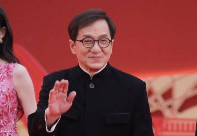 Jackie Chan’s daughter claims sweet viral video is “fake” - www.nme.com