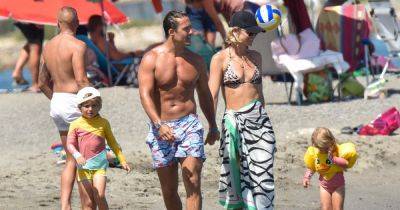 Vogue Williams and Spencer Matthews flaunt beach bodies during day out with kids - www.ok.co.uk - Spain - county Spencer