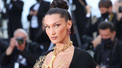 Bella Hadid Returns to Set for First Time in 5 Months After Lyme Disease Treatment, Celebrates With Song - www.etonline.com