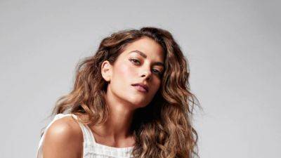 Inbar Lavi Explains How Her Israeli, Polish and Moroccan Background Influenced Her Curly Hair Routine - www.etonline.com - Canada - Poland - Morocco - Israel