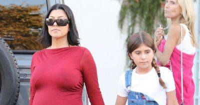 Kourtney Kardashian flaunts baby bump in skintight red dress on day out with daughter Penelope - www.ok.co.uk - Malibu