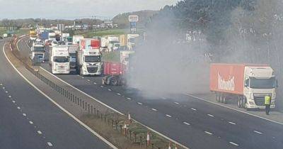 Bravery of motorists who dragged woman from burning lorry 'commended' by coroner - www.manchestereveningnews.co.uk
