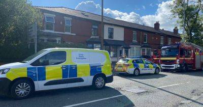 Forensics on scene of house fire with investigations underway after 'explosion' - www.manchestereveningnews.co.uk - Manchester
