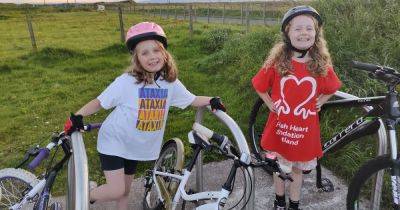 Sisters take on 100 mile cycle to support their grandfathers - www.dailyrecord.co.uk - Britain