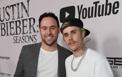 Justin Bieber reportedly splits from manager Scooter Braun - www.nme.com