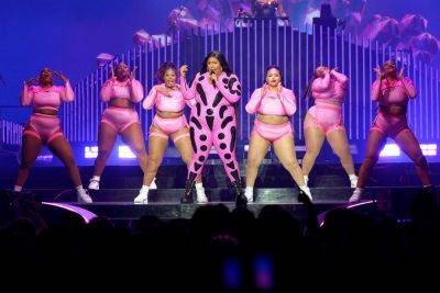 Lizzo Gets Support From Her Big Grrrls Dancers Amid Lawsuit Controversy - etcanada.com - Japan - Beyond