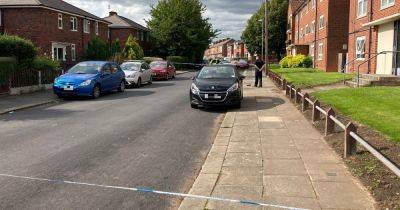 Street taped off after 'man hit by car' before youth 'brandishes knife' - www.manchestereveningnews.co.uk - Manchester