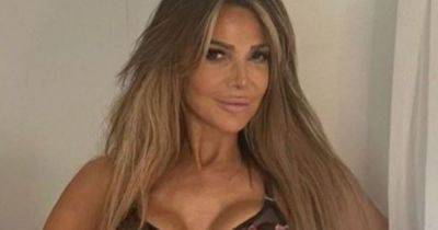Lizzie Cundy shows off her toned figure as she models floral embroidered lingerie - www.ok.co.uk - Britain - London