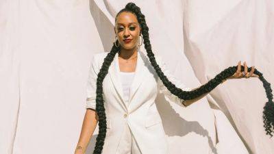Tia Mowry Credits Her Natural Hair Care Line’s Success to One Special Ingredient - www.glamour.com