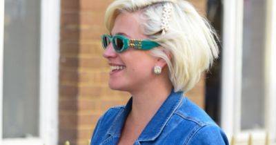 Pregnant Pixie Lott proudly parades blossoming baby bump in stylish denim jumpsuit - www.ok.co.uk - Britain - London