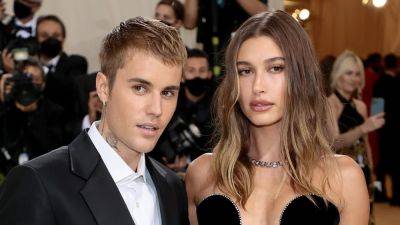 Hailey Bieber Reacts to Husband Justin Starring in SZA's Steamy New 'Snooze' Music Video - www.etonline.com