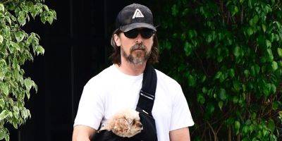 Christian Bale Brings His Tiny Puppy On A Scooter Ride in LA - www.justjared.com - Los Angeles