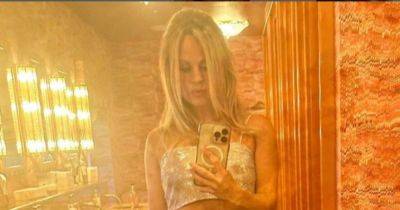 Coronation Street star Tina O'Brien branded 'sensational' as she shows off abs in crop top and mini skirt after 40th - www.manchestereveningnews.co.uk - Italy