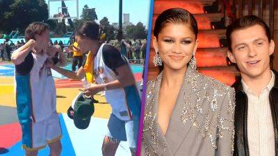 Zendaya and Boyfriend Tom Holland Have Fun Twinning Moment as She Supports Him During Charity Basketball Game - www.etonline.com - California - county Oakland