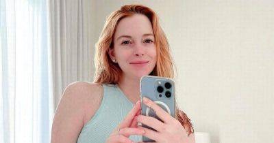 Lindsay Lohan 'so proud' of postpartum body as she poses in crop top 2 weeks after son's birth - www.ok.co.uk
