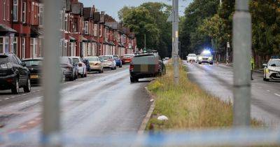 Police tape off road as boy, 9, rushed to hospital after being hit by car - www.manchestereveningnews.co.uk - Manchester