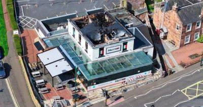 Bothwell 'firebomb' aftermath pictured as restaurant roof collapses during 'suspicious' blaze - www.dailyrecord.co.uk - Scotland