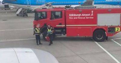 Passenger falls ill on Ryanair flight as plane met by emergency services in Edinburgh - www.dailyrecord.co.uk - Spain - Scotland - Beyond