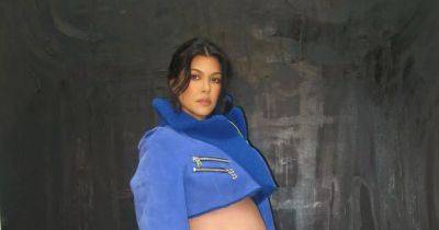 Kourtney Kardashian oozes confidence as she flaunts bare bump in mini skirt and crop top - www.ok.co.uk - Los Angeles