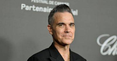 Robbie Williams reveals plastic surgery plans amid body dysmorphia battle - www.ok.co.uk