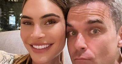 Robbie Williams and Ayda Field look loved-up as they celebrate their 13th wedding anniversary - www.ok.co.uk - Switzerland