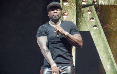 50 Cent accused of deliberately targeting woman in mic throwing incident at LA show - www.nme.com - Chicago