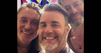 Take That fans say 'stop teasing' as 'beautiful' trio posts reunion picture - www.manchestereveningnews.co.uk - Britain